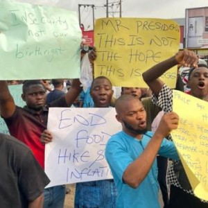 Despite police warnings, protesters take to the streets of Lagos amidst economic hardship.
